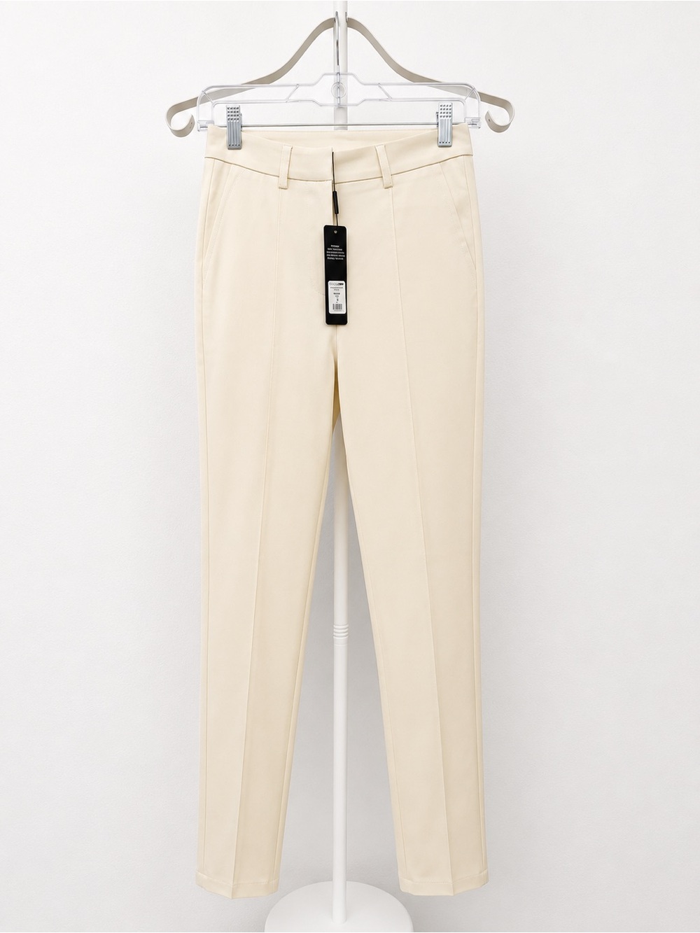 Ivory skinny dress pants